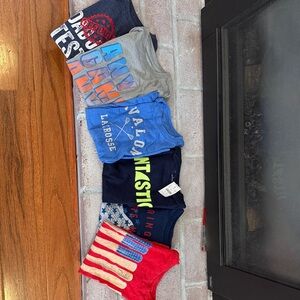 Bundle of boys short sleeve shirts.
